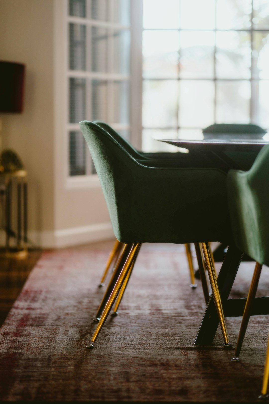 elegant-chairs-surround-a-table-in-a-bright-dining-room-drcjcmqpa4g